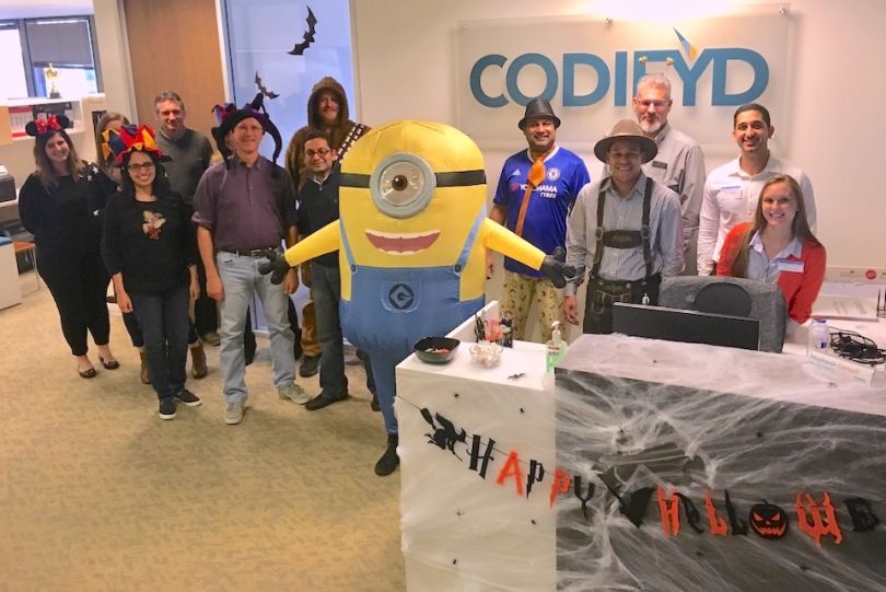Codifyd staff posing during Halloween party