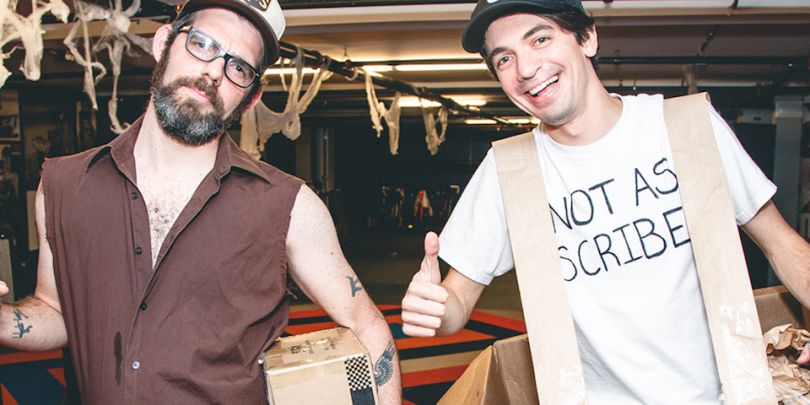 Two Reverb employees in costume posing