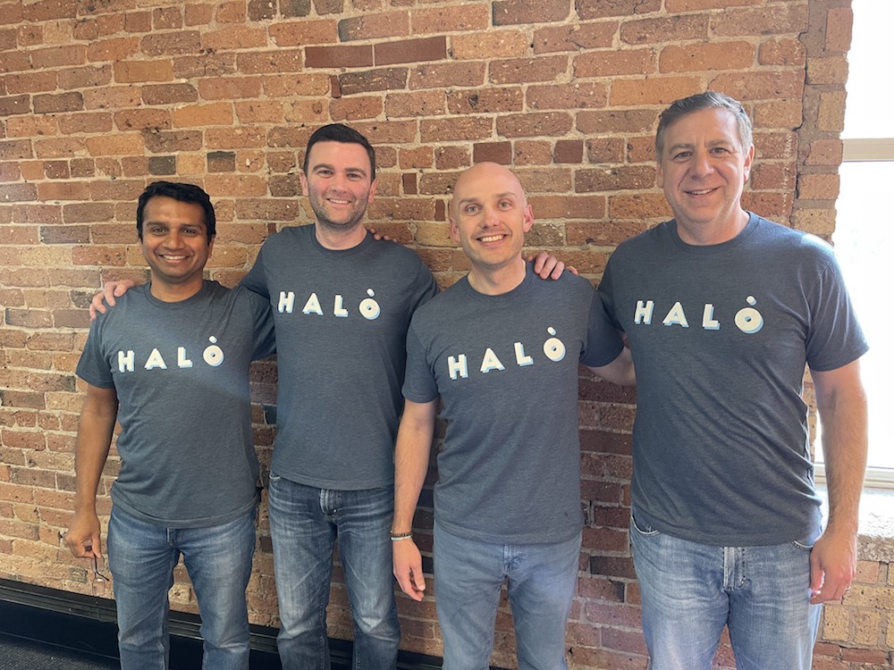Halo investing employees wearing company t-shirts