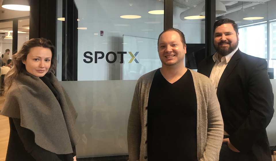 SpotX team in their office